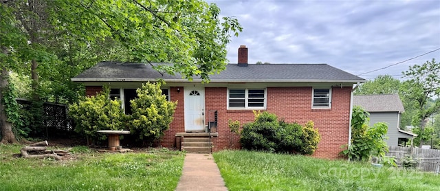 8 Mountain Ter, Asheville, NC 28806 - view of front of house featuring a chimney, brick siding, and a shingled roof