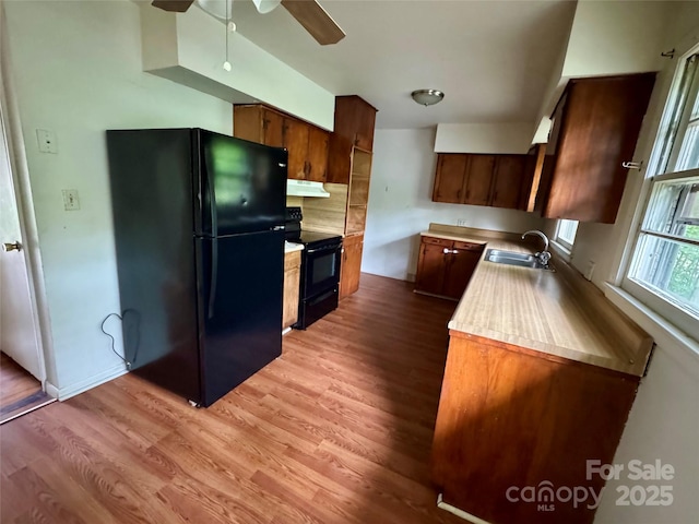8 Mountain Ter, Asheville, NC 28806 - kitchen featuring black appliances, under cabinet range hood, light wood-style flooring, and a ceiling fan
