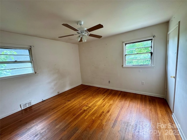 8 Mountain Ter, Asheville, NC 28806 - empty room featuring light wood-style flooring, ceiling fan, and baseboards