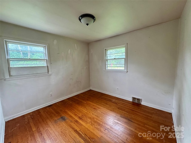 8 Mountain Ter, Asheville, NC 28806 - spare room with wood-type flooring and baseboards