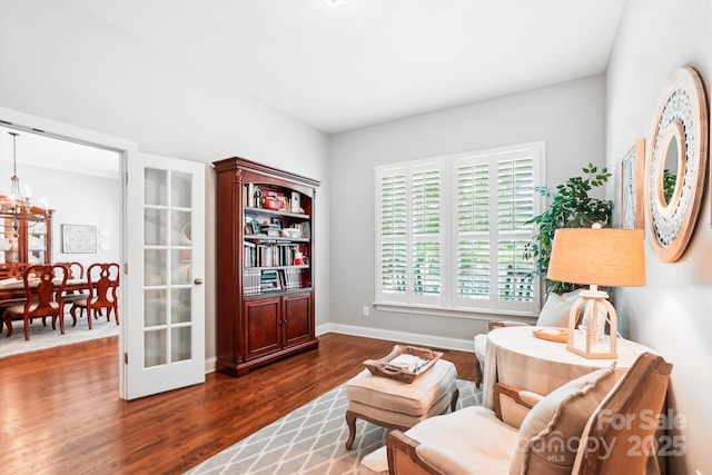 5424 Morris Hunt Dr, Fort Mill, SC 29708 - living area with wood finished floors, a chandelier, and baseboards