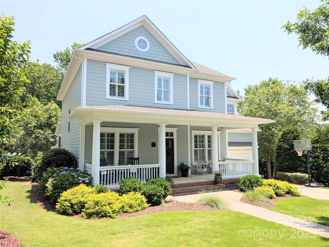 5424 Morris Hunt Dr, Fort Mill, SC 29708 - view of front facade with covered porch and a front lawn