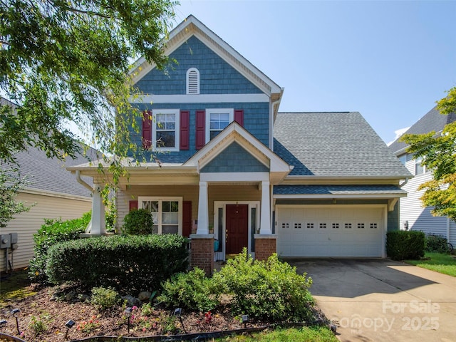 1410 Kenton Ln, Asheville, NC 28803 - craftsman inspired home featuring concrete driveway, a garage, and a shingled roof
