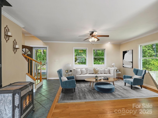 58 Randall Dr, Fairview, NC 28730 - living room featuring plenty of natural light, stairway, ornamental molding, baseboards, and ceiling fan