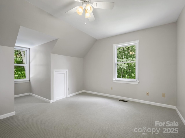 58 Randall Dr, Fairview, NC 28730 - additional living space featuring carpet, baseboards, lofted ceiling, and a ceiling fan