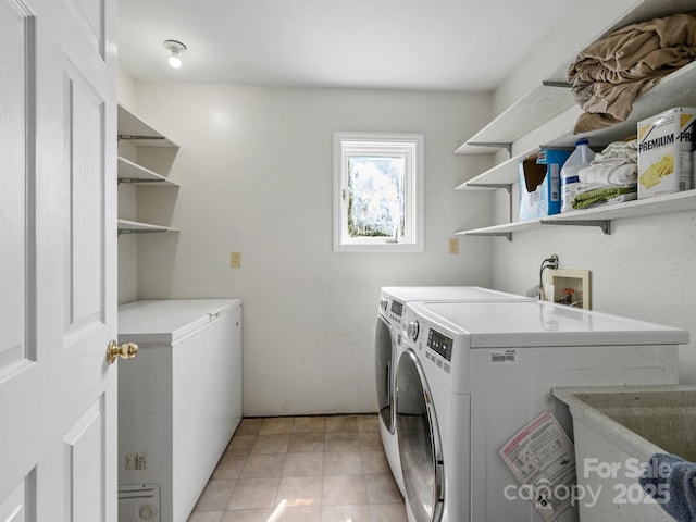58 Randall Dr, Fairview, NC 28730 - laundry room featuring washing machine and dryer and light tile patterned flooring