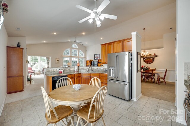 539 Turquoise Way, Fort Mill, SC 29708 - dining room with ceiling fan, lofted ceiling, light tile patterned flooring, a chandelier, and recessed lighting