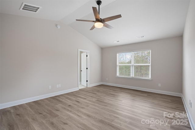 6712 W Sugar Creek Rd, Charlotte, NC 28269 - unfurnished room featuring vaulted ceiling, a ceiling fan, light wood-style flooring, and baseboards
