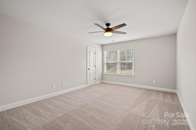 6712 W Sugar Creek Rd, Charlotte, NC 28269 - spare room with a ceiling fan, light carpet, and baseboards
