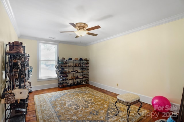 420 S Cedar St, Lincolnton, NC 28092 - exercise room with ceiling fan, ornamental molding, wood finished floors, and baseboards