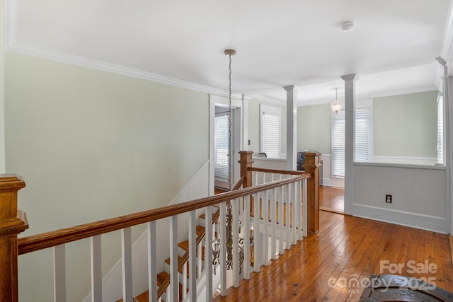 420 S Cedar St, Lincolnton, NC 28092 - hallway featuring an upstairs landing, hardwood / wood-style floors, crown molding, wainscoting, and ornate columns