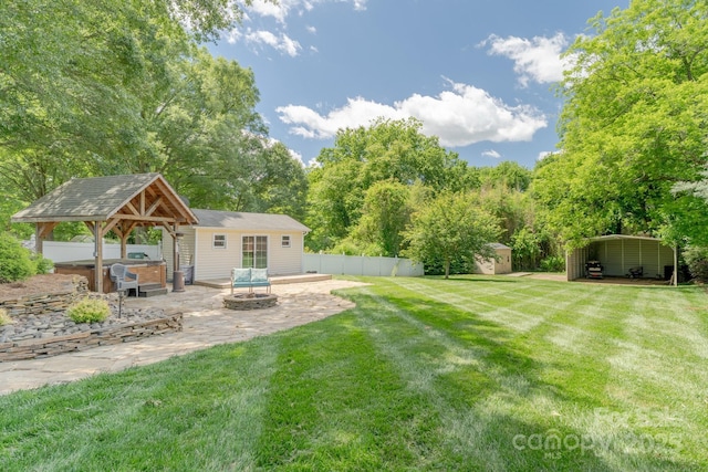 420 S Cedar St, Lincolnton, NC 28092 - view of yard with a fire pit, an outdoor structure, a gazebo, and a patio area