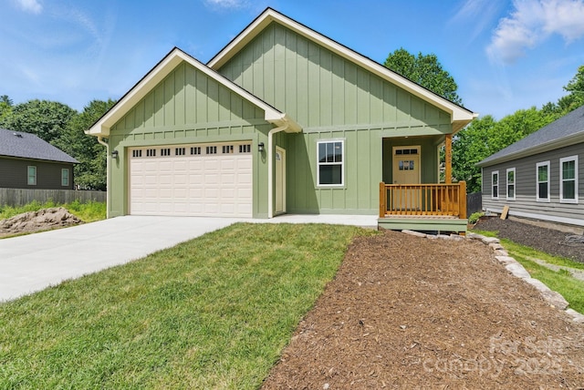192 Plato Pl, Etowah, NC 28729 - view of front of property featuring board and batten siding, an attached garage, driveway, and a porch