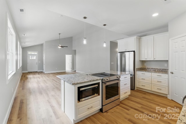 192 Plato Pl, Etowah, NC 28729 - kitchen featuring stainless steel appliances, light wood-type flooring, white cabinetry, baseboards, and light stone countertops