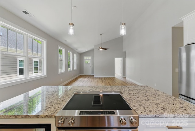 192 Plato Pl, Etowah, NC 28729 - kitchen with freestanding refrigerator, a ceiling fan, light wood finished floors, stove, and open floor plan