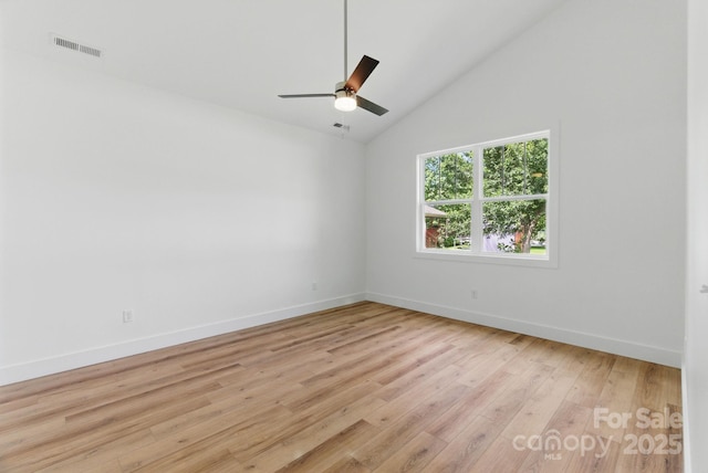 192 Plato Pl, Etowah, NC 28729 - empty room featuring light wood finished floors, baseboards, ceiling fan, and high vaulted ceiling