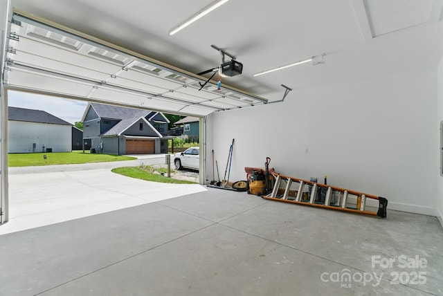 192 Plato Pl, Etowah, NC 28729 - garage featuring a garage door opener