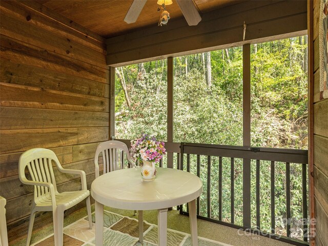 55 Lake Dr Unit 4P, Laurel Park, NC 28739 - sunroom / solarium with ceiling fan and outdoor dining area