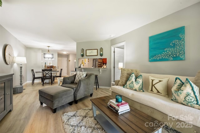 2533 Stockbridge Dr, Charlotte, NC 28210 - living area featuring light wood finished floors and baseboards