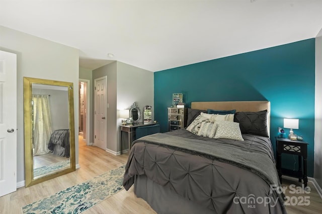2533 Stockbridge Dr, Charlotte, NC 28210 - bedroom featuring light wood-style floors and baseboards