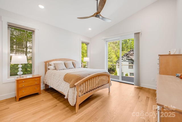 15 Ledgestone Dr, Fairview, NC 28730 - bedroom featuring multiple windows, access to outside, light wood finished floors, baseboards, and lofted ceiling