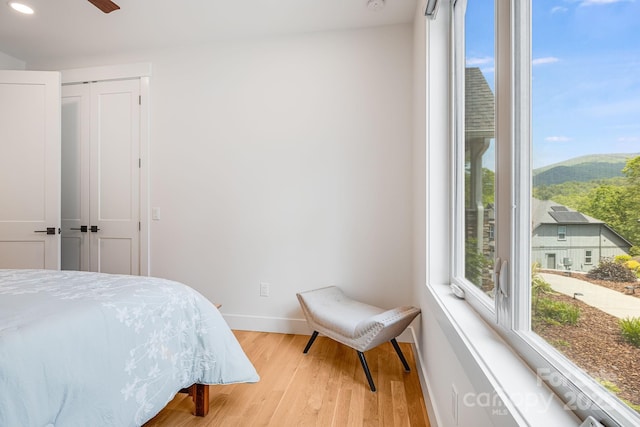15 Ledgestone Dr, Fairview, NC 28730 - bedroom featuring baseboards, wood finished floors, recessed lighting, and a mountain view