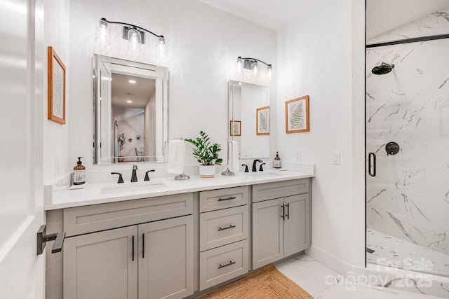 15 Ledgestone Dr, Fairview, NC 28730 - full bathroom featuring marble finish floors, a marble finish shower, double vanity, and baseboards