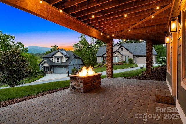 15 Ledgestone Dr, Fairview, NC 28730 - view of patio / terrace with an outdoor fire pit and a mountain view