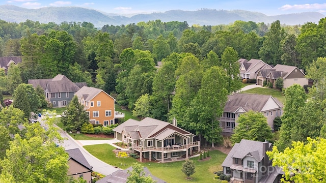 15 Ledgestone Dr, Fairview, NC 28730 - aerial view of residential area featuring a forest and a mountainous background