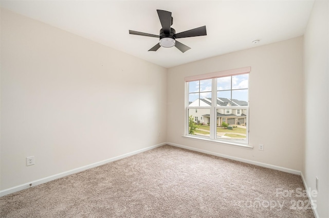 9009 Odell Corners Blvd NW, Concord, NC 28027 - empty room with carpet floors, baseboards, and a ceiling fan