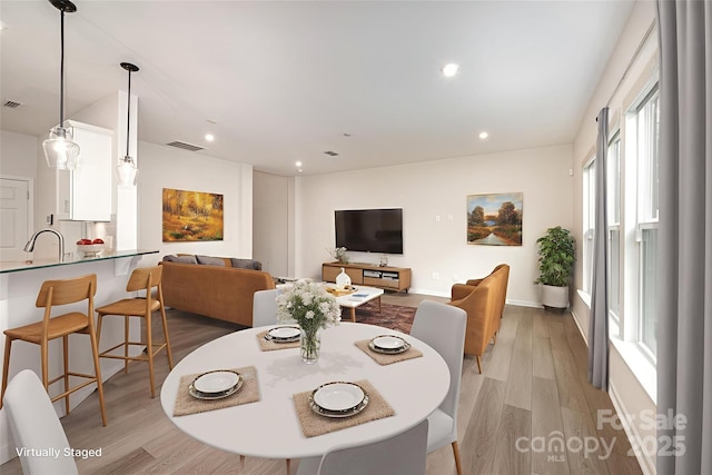 9009 Odell Corners Blvd NW, Concord, NC 28027 - dining area featuring light wood-style flooring, recessed lighting, and baseboards