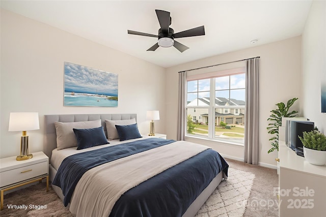 9009 Odell Corners Blvd NW, Concord, NC 28027 - bedroom with carpet floors, baseboards, and a ceiling fan