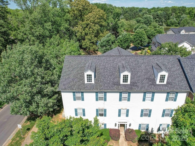 1023 Triece Ln, Charlotte, NC 28215 - view from above of property with a heavily wooded area