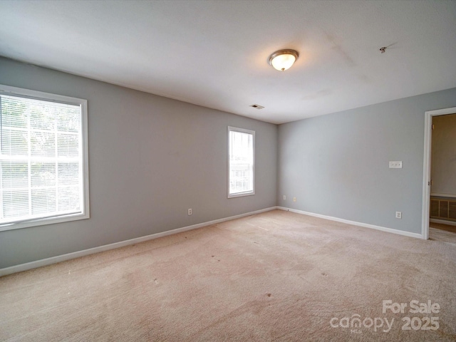 1023 Triece Ln, Charlotte, NC 28215 - spare room with carpet and baseboards