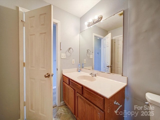 1023 Triece Ln, Charlotte, NC 28215 - half bathroom with vanity and toilet