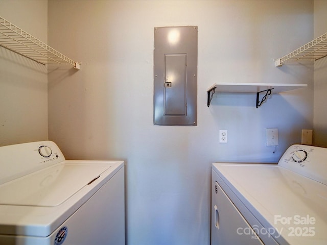 1023 Triece Ln, Charlotte, NC 28215 - washroom featuring electric panel and washer and clothes dryer