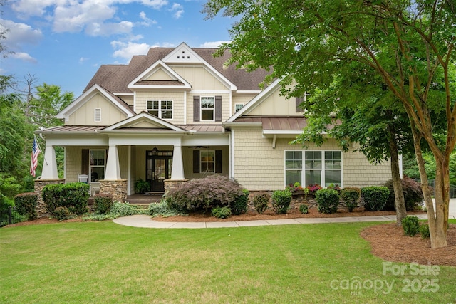 6873 Pine Moss Ln, Clover, SC 29710 - craftsman-style home featuring a standing seam roof, a porch, a front yard, and roof with shingles