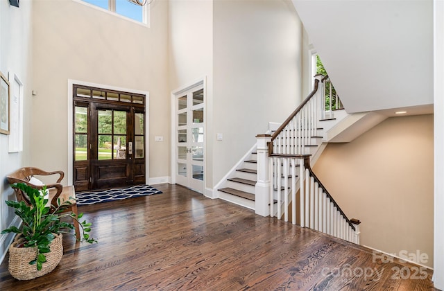 6873 Pine Moss Ln, Clover, SC 29710 - entryway featuring a high ceiling, french doors, wood finished floors, stairway, and baseboards