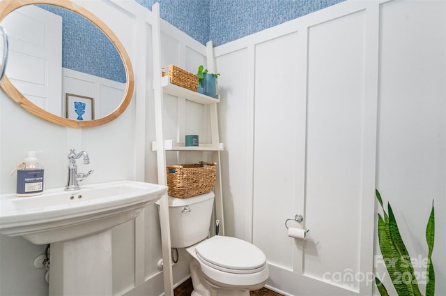 6873 Pine Moss Ln, Clover, SC 29710 - bathroom with toilet, a decorative wall, and wallpapered walls