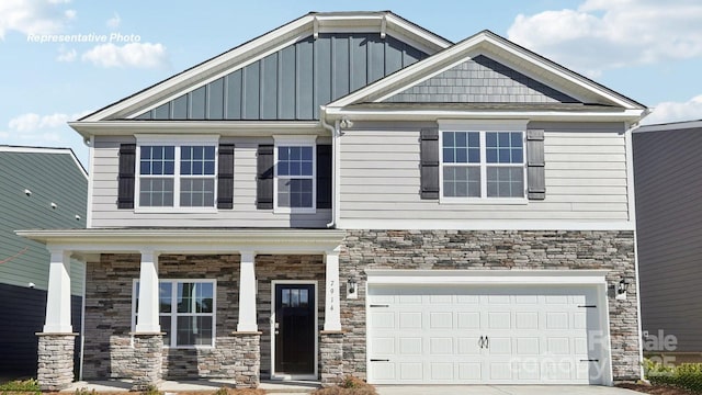 3734 Coleman Dr, Charlotte, NC 28215 - craftsman house featuring stone siding, driveway, board and batten siding, covered porch, and a garage