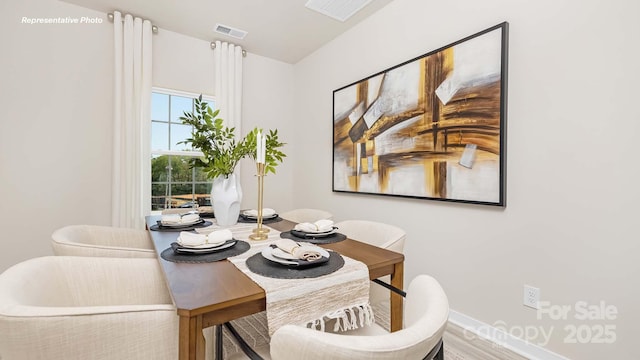 3734 Coleman Dr, Charlotte, NC 28215 - dining space featuring baseboards and wood finished floors