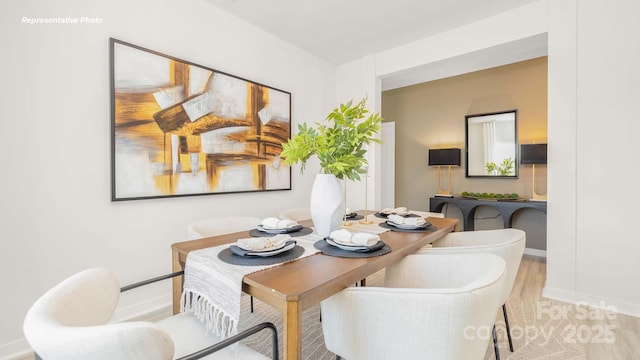 3734 Coleman Dr, Charlotte, NC 28215 - dining space with baseboards and wood finished floors