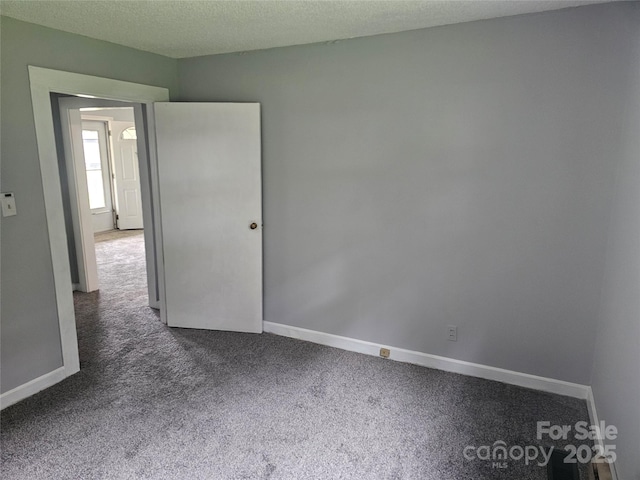 905 Klondale St, China Grove, NC 28023 - empty room with carpet floors and baseboards