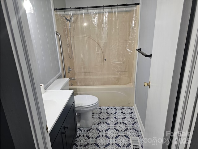 905 Klondale St, China Grove, NC 28023 - bathroom featuring vanity, shower / tub combo with curtain, toilet, and baseboards