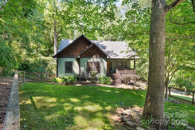 6 Woodland Rd W, Asheville, NC 28806 - view of front of property featuring a porch, stairway, and roof with shingles