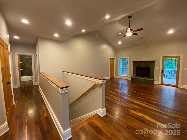 6 Woodland Rd W, Asheville, NC 28806 - hall with an upstairs landing, dark wood-style floors, vaulted ceiling, baseboards, and recessed lighting