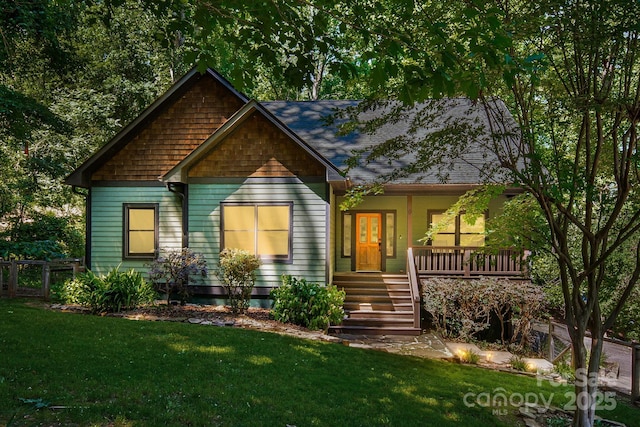 6 Woodland Rd W, Asheville, NC 28806 - view of front of house featuring covered porch and a shingled roof