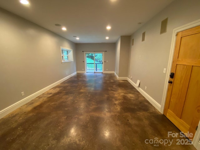 6 Woodland Rd W, Asheville, NC 28806 - empty room featuring finished concrete flooring, recessed lighting, and baseboards