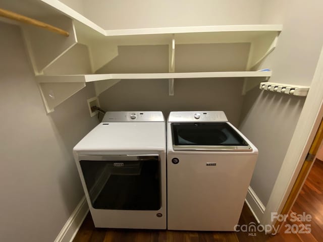 6 Woodland Rd W, Asheville, NC 28806 - laundry room featuring washing machine and dryer, dark wood-style flooring, and baseboards