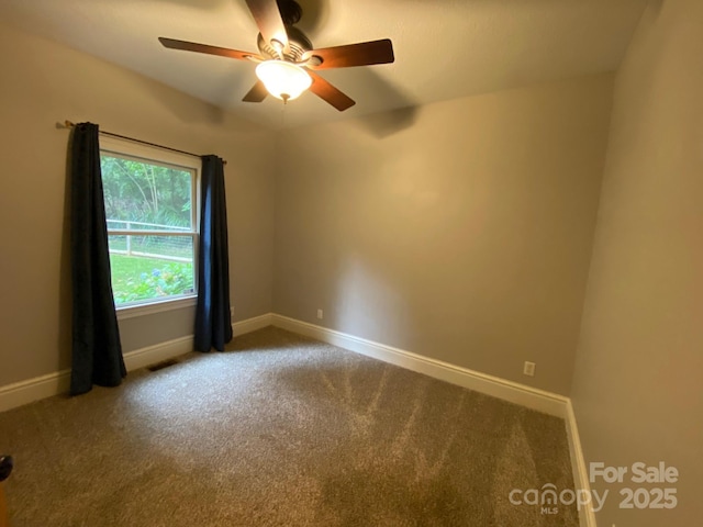 6 Woodland Rd W, Asheville, NC 28806 - unfurnished room with carpet, a ceiling fan, and baseboards